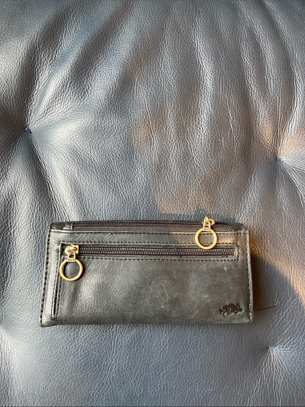 Roots Black Leather Wallet with Gold Key Ring Accent